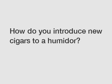 How do you introduce new cigars to a humidor?